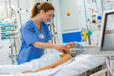 Nurse Caring Patient High Res Stock Photo Getty Images