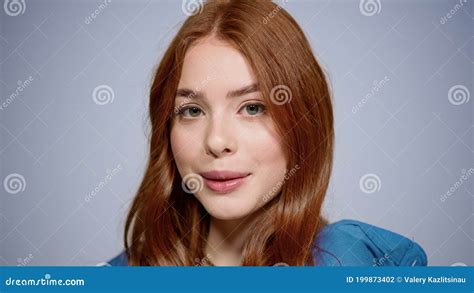 Attractive Redhead Girl Impressing Somebody In Studio Woman Flirting