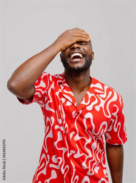 Cheerful Black Man Laughing With Eyes Closed Stock Photo Adobe Stock