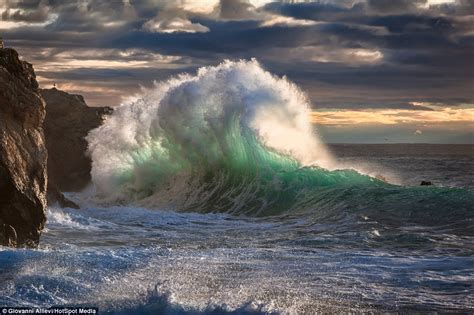 Dramatic Photographs Show Ice Cold Waves Crashing Against Italian