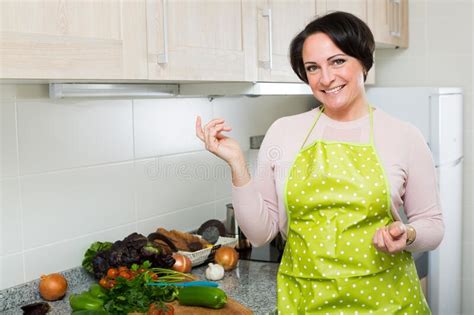 Portrait Of Cooking Brunette Housewife In Apron Stock Image Image Of