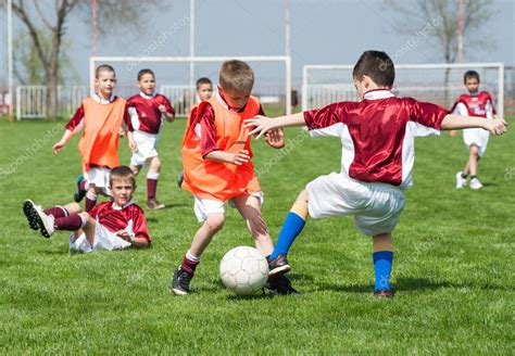 Children Playing Soccer ⬇ Stock Photo Image By © Fotokostic 25546807