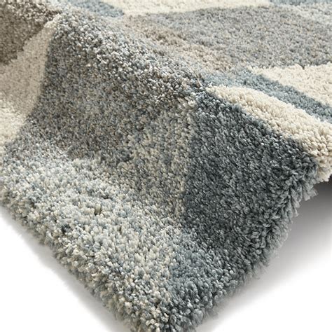Tibetan rugs come in many forms and shapes, from traditional to strictly modern. Royal Nomadic 7611 Grey Teal Rug From Only £59.00