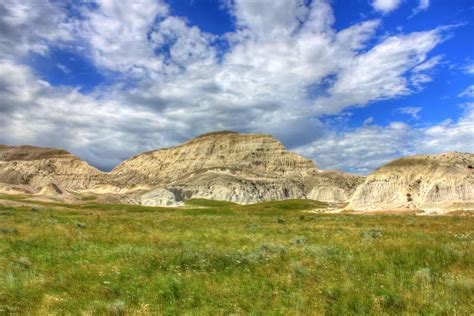 Scattered Clouds Over A Peak At White Butte North Dakota Image Free