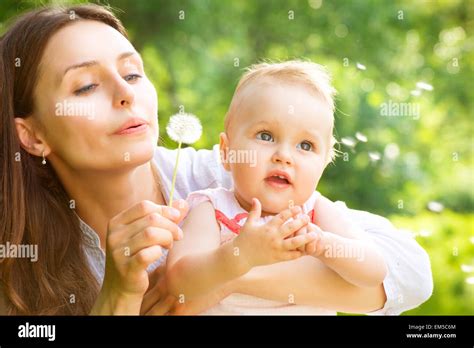 Beautiful Mother And Baby Outdoors Nature Stock Photo Alamy