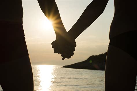 Couple On A Beach Holding Hands At Sunset Photograph By Newnow Photography By Vera Cepic Pixels