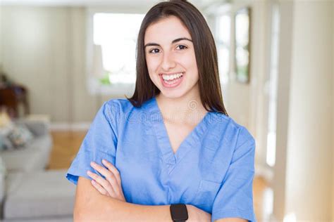 Beautiful Young Nurse Woman At The Clinic Happy Face Smiling With
