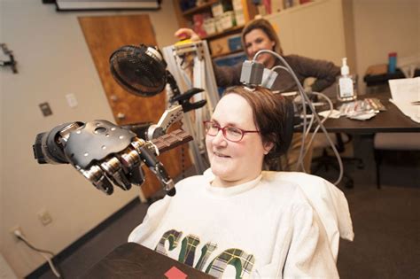 Quadriplegic Woman Moves Robot Arm With Her Mind Thought Control