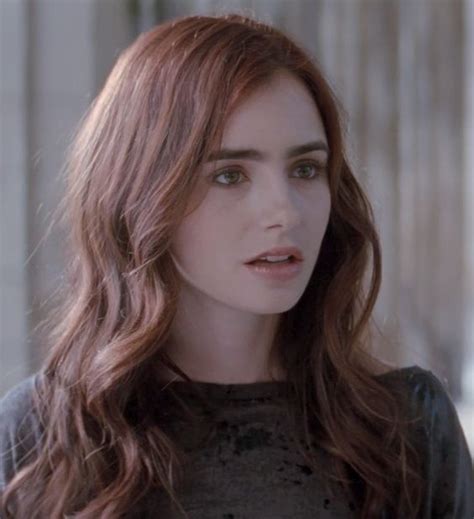Strong Eyebrows And Brown Eyeshadow Surrounding The Eye Lily Collins