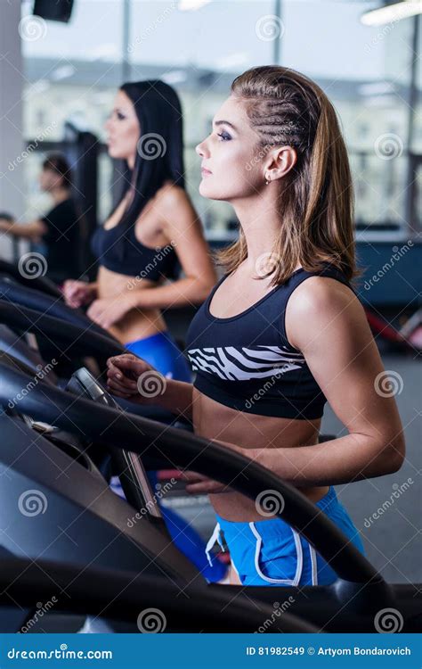 Fit Women Running On Treadmills In Modern Gym Healthy Young Young
