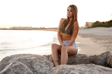 Wallpaper Brunette Women Outdoors Rocks Bra Jean Shorts Sea Beach Tanned Sunset Brown