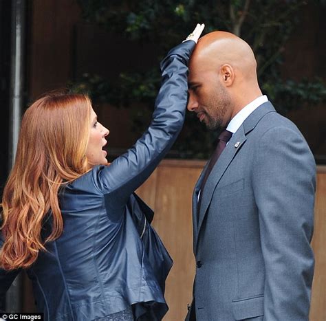 Poppy Montgomery Shares Sizzling Kiss With Her Handsome Co Star In First Look At New Tv Scenes