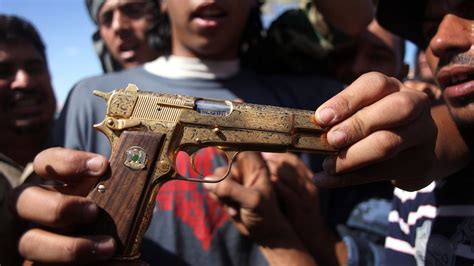 Qaddafi Died Packing A Giant Golden Gun