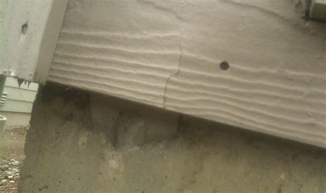 Identification here can usually be visually identified by the presence of small fibers (that is the asbestos roofing material) on the end grain or any broken section of the product. Help identifying siding (foundation, paint, plank ...