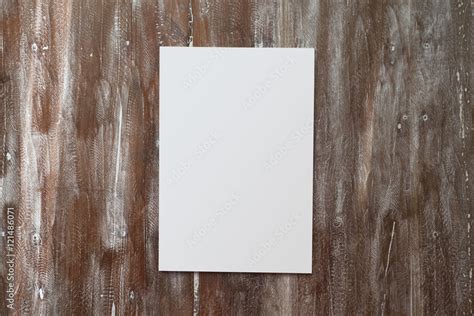 Closeup Blank White Paper Sheet Mockup Natural Wood Table Background