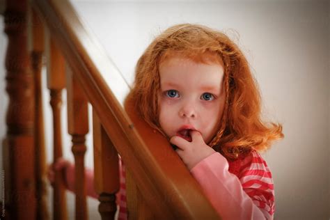 Little Girl Crying On Stairs At Home By Stocksy Contributor Craig