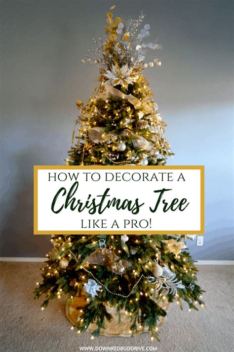 Decorating your tree at christmas can be a great way to get the whole family in a festive mood. How to Decorate a Christmas Tree Like a Pro! | It's all about the layers!