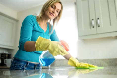 Woman Doing House Chores Stock Photo By Wavebreakmedia