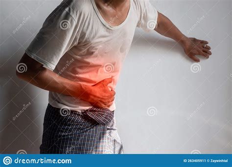 Asian Man Suffering From Upper Abdominal Pain It Can Be Caused By