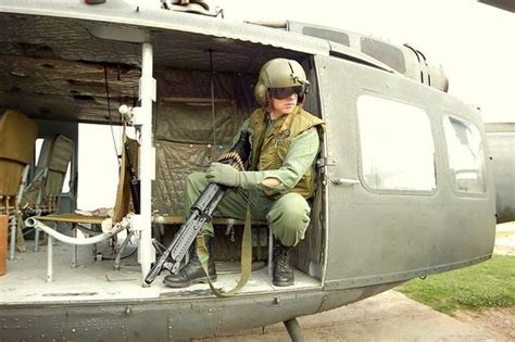 Door Gunner Mask And A Swedish Uh 60m Door Gunner Pictured During A
