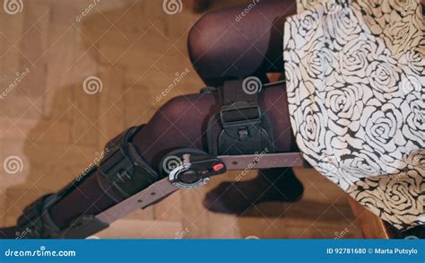 Lady Putting On Supportive Leg Brace Stock Footage Video Of Patient