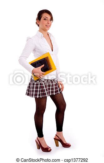 Stock Photo Of Full Body Pose Of Smiling Young Student With Books On An