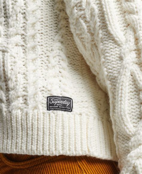 women s cable knit polo neck jumper in cream superdry ie