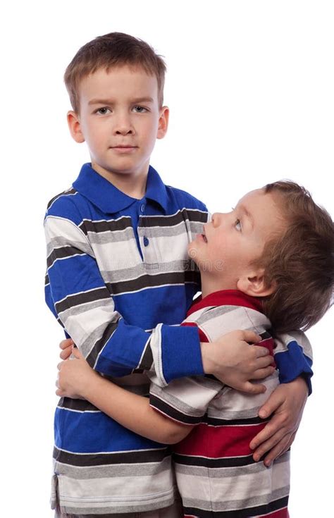 Younger Brother Looks At His Big Brother Stock Photo Image Of Blue