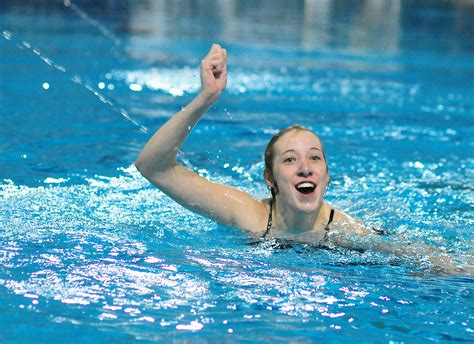 Ames Junior Rachel Canon Celebrates After Performing The Final Dive In