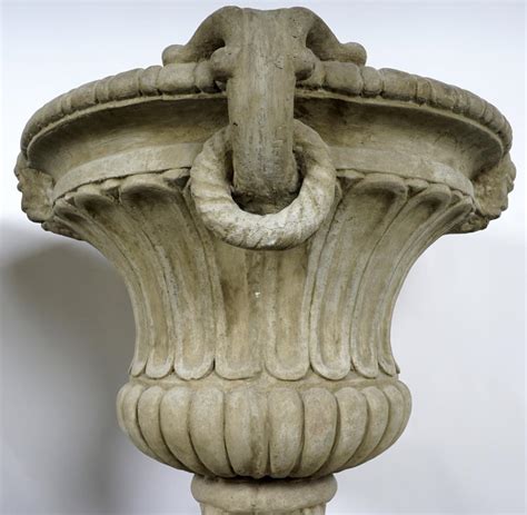 Pots and planters are a wonderful way to grow plants in locations where you would not ordinarily be able to, like a patio, or kitchen shelf. Pair Large Outdoor Concrete Urns / Planters