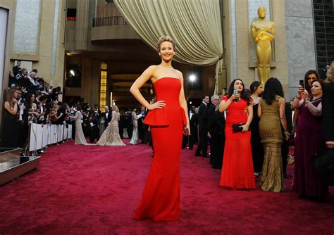 Academy Awards 2014 Jennifer Lawrence Trips At The Oscars Again This