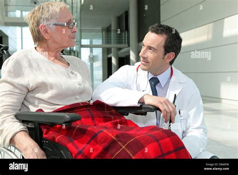 Doctor Answering His Patients Questions Stock Photo Alamy