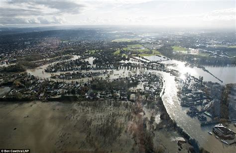 uk weather shocking aerial images show wide scale flooding of thames commuter belt homes