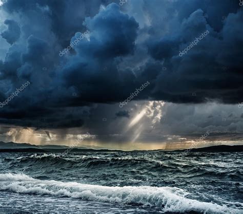 Heavy Rain Over Stormy Ocean — Stock Photo © Nejron 51891829