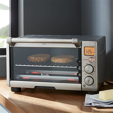 This small mini oven has an innovative design that allows you to cook any foods that you want. Breville Compact Smart Oven + Reviews | Crate and Barrel