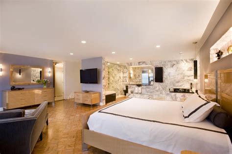 Minimalist interior of basement bedroom idea. 12 Breathtaking Ideas for Luxury Basements | Brothers ...