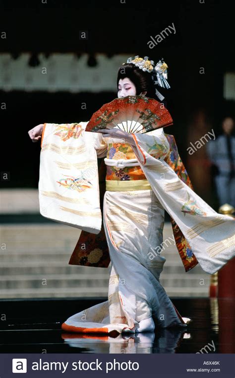 A Geisha Performs A Traditional Dance At The Meiji Shrine In Tokyo