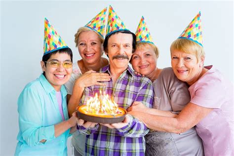 Seniors On A Birthday Party Stock Photo Image Of Person Decoration