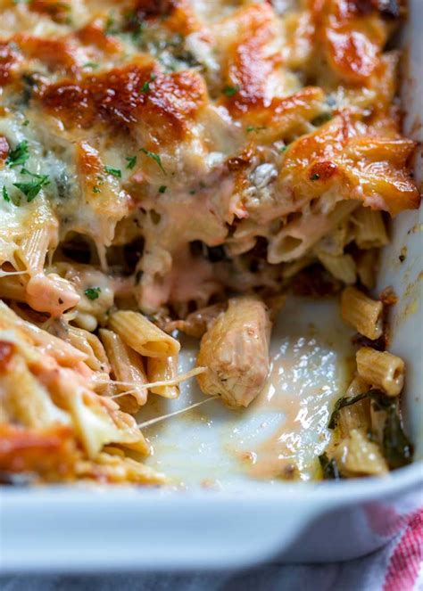 Add the spinach and cook for 2 to 3 minutes until the spinach is wilted and the sauce has thickened. Tuscan Chicken Pasta Bake - Kevin Is Cooking