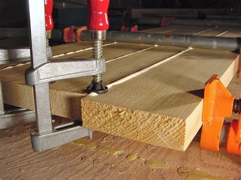 My original plan was to turn the planks sideways, tack a long vertical piece of hardwood along the edge and run a router down it to make a spline inlay and then glue in a long vertical piece of wood approx 1.5 wide and then 3 or 4 butterflys ontop. HOW TO BUILD A TABLE: Tricks for Getting It Really, Really Right - Baileylineroad