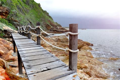 Wooden Bridge And The Sea With Dark Rain Cloudy Stock Image Image Of