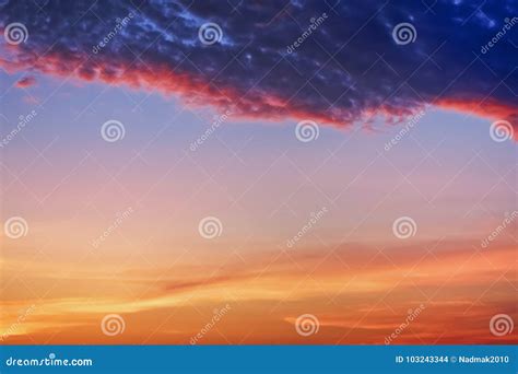 Storm Cloud At Sunset Before An Approaching Thunderstorm Stock Photo