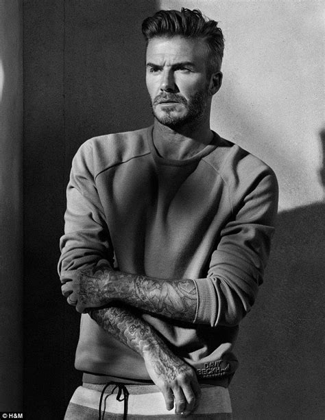 david beckham shows off his muscles as he models new fashion range david beckham david