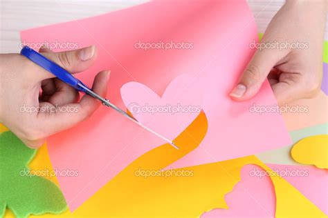 Women Hand Cutting Colorful Paper With Scissors Stock Photo By