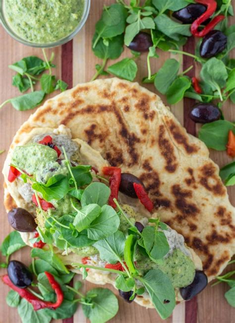 .naan bread, which was then filled with 4 pieces of freshly fried crispy falafel balls, sitting on top of you can see that it's a very similar technique & method to the way indian tandoor naan bread is made. Greek Falafel Naan Sandwiches Recipe - Chisel & Fork