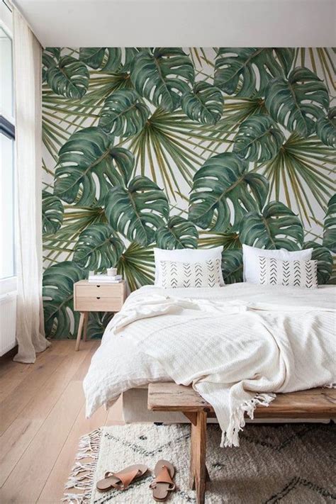 Natural woven textures, airy linen. stylish-bedroom-design-with-tropical-wallpaper