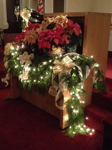 Communion Table Christmas Decor Poinsettias Lights Evergreen Garland