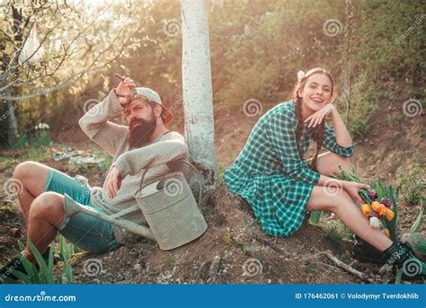 Couple In The Farm On Countryside Background Happy Couple Farmers