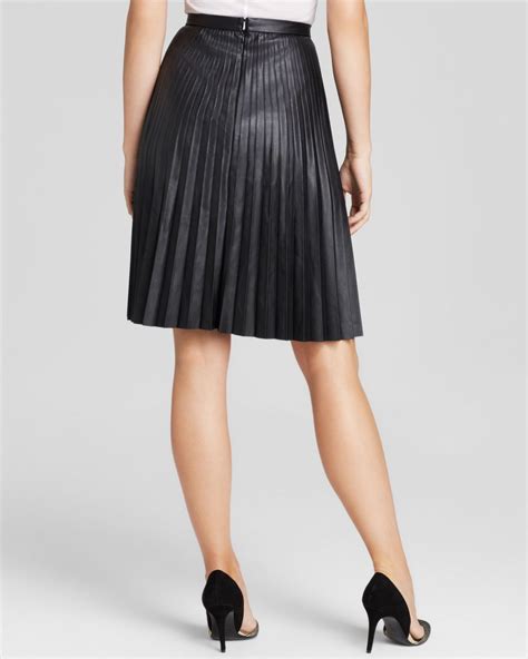 Lyst Calvin Klein Faux Leather Pleated Skirt In Black