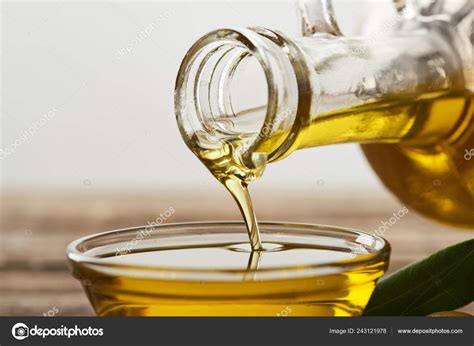 Pouring Olive Oil Bottle Glass Bowl Grey Background Stock Photo By